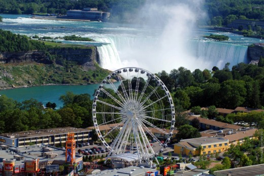 The Ferris wheel in Ontario, Canada, with the spectacular Niagara Falls in the background.