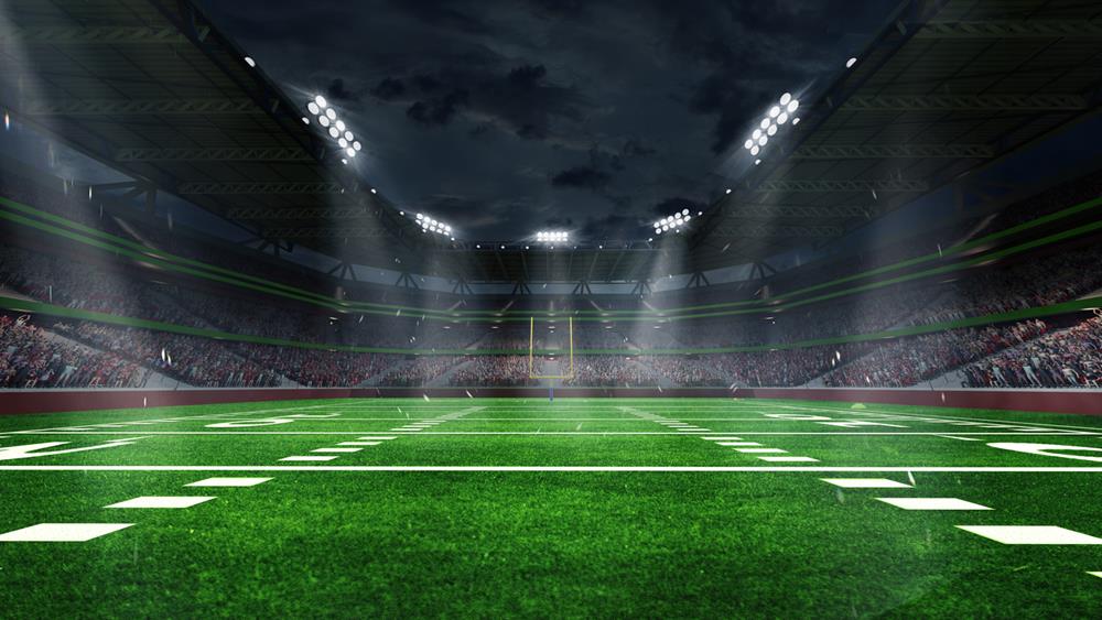 American football arena with yellow goal post