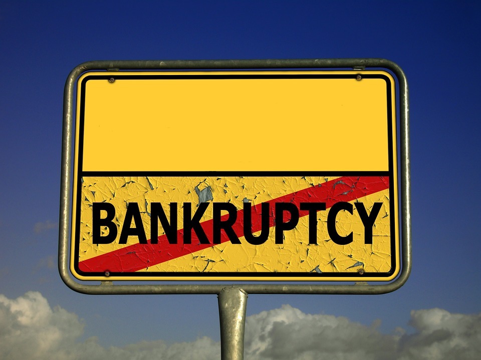 an image of a board showing a sign of bankruptcy