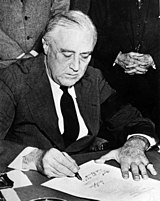 Franklin Roosevelt signing the declaration of war against Japan (left) on December 8 and against Germany (right) on December 11, 1941