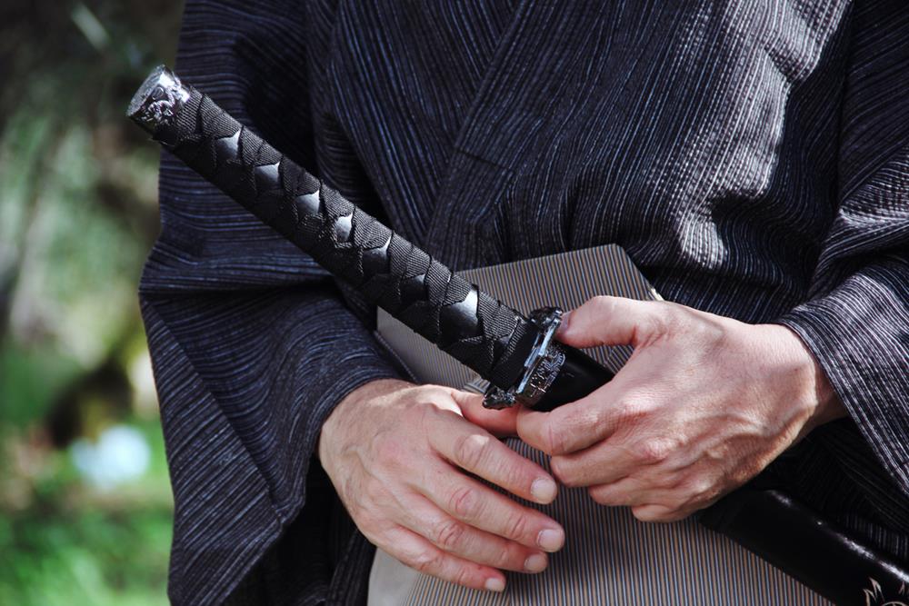 Samurai hands with typical sword