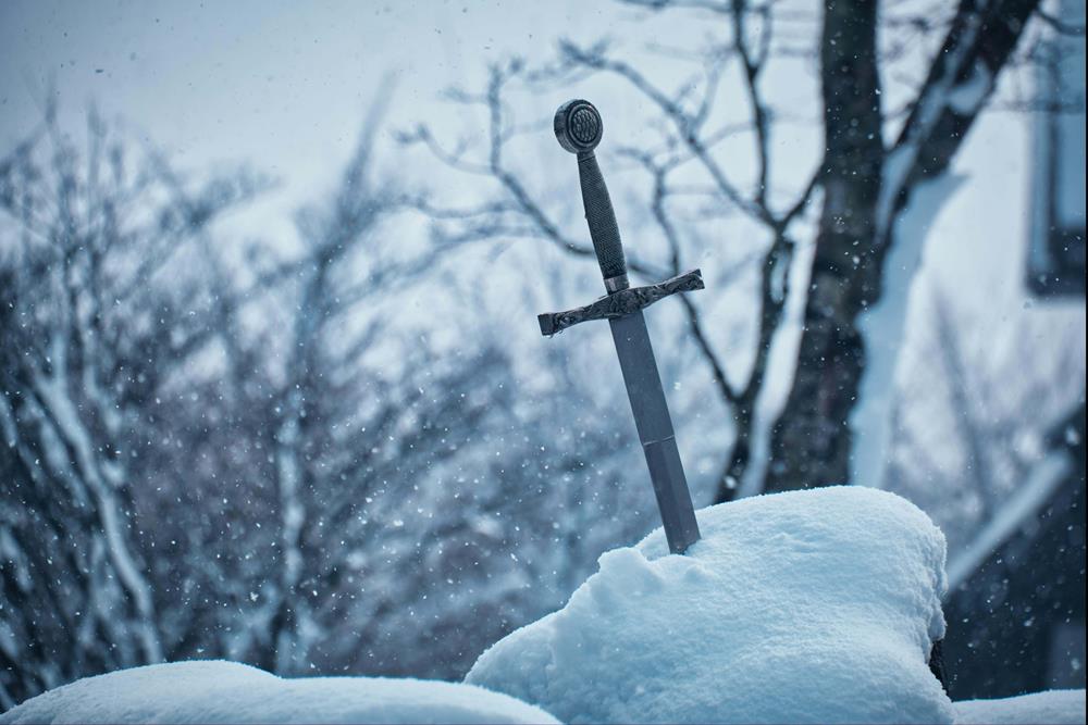 Medieval sword in snow