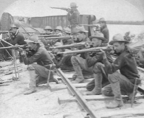 Company E, 9th US Infantry Regiment, guarding the railway bridge at Santo Tomas, Pampanga Province. PHOTO was taken in 1899.