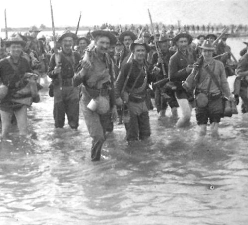 12th Infantry fording river Tarlac cr 1900 bwk