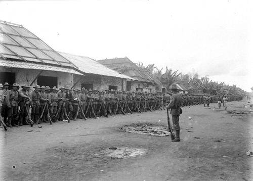 20th infantry 3rd bn, drawn up in main street of Pasig after Cainta Fight, March 16 1899