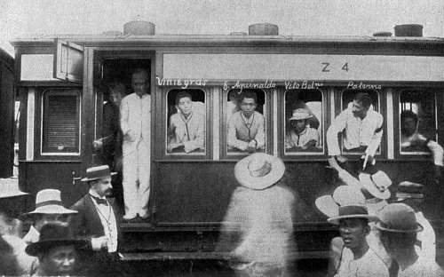 Aguinaldo on train with etc Dec 27 1898
