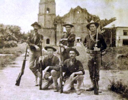 American patrol 1900 church in background