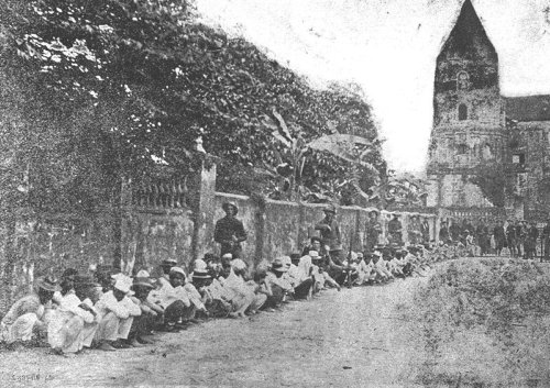 Filipino POWs near San Miguel Church Feb 5 1899