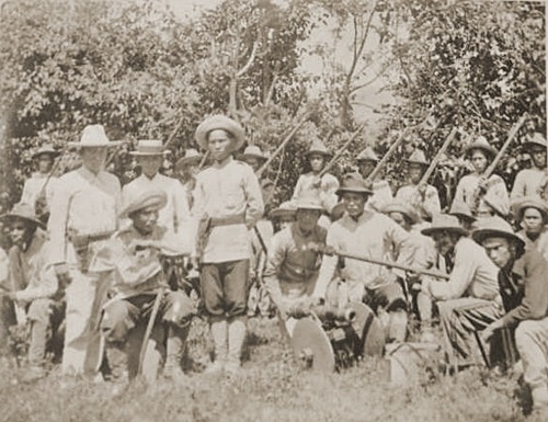 Filipino officers and soldiers with native cannon