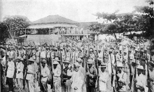 Filipino soldiers of General Juan Cailles US flag in surrender at Santa Cruz Laguna June 21 1901