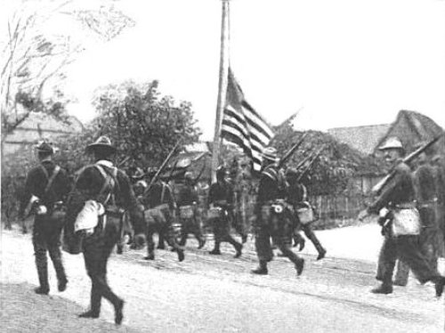 First Colorado with flag in Ermita Aug 13 1898
