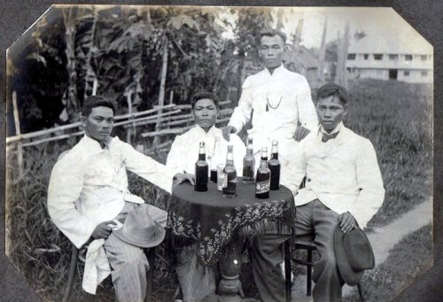 Four Filipinos drinking in Lt James E Ware 14th Inf Vancouver Bks WA Album