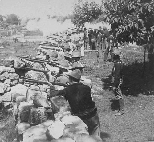 Taguig, 1st WA Volunteers behind stone wall March 18-19 1899 underwood