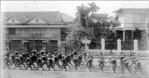 US Soldiers marching on Calle Concordia, Manila 1900