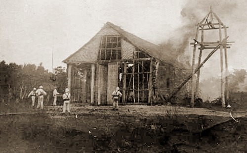 USS Vicksburg sailors burn a church in Samar