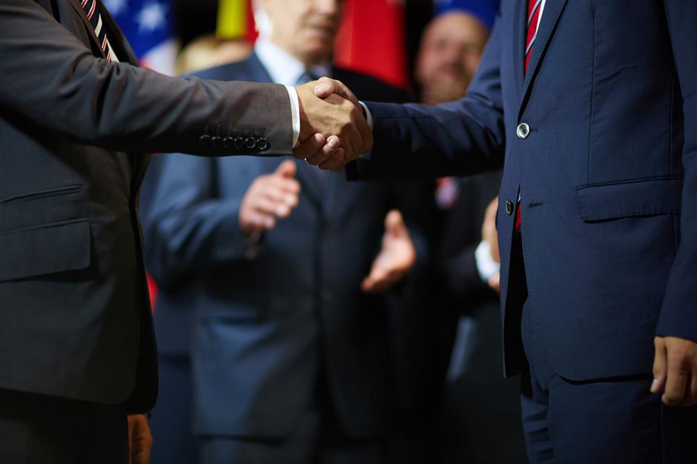 Politicians shaking hands with each other