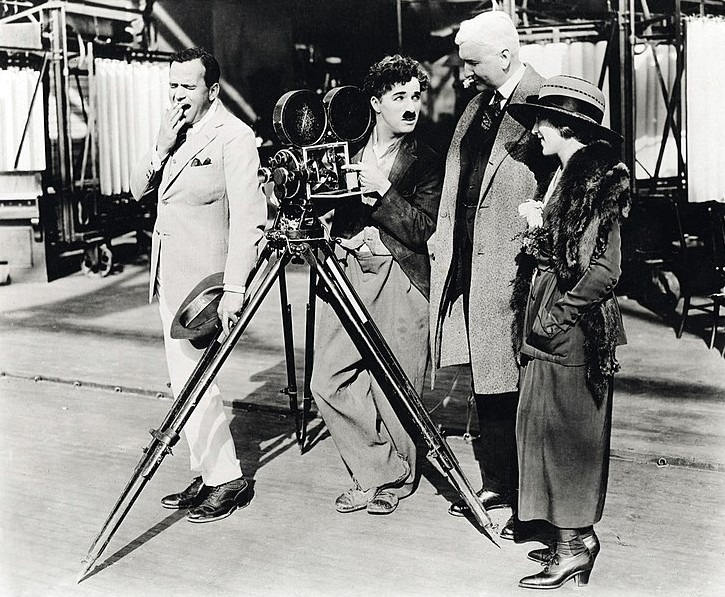 Charlie Chaplin while filming