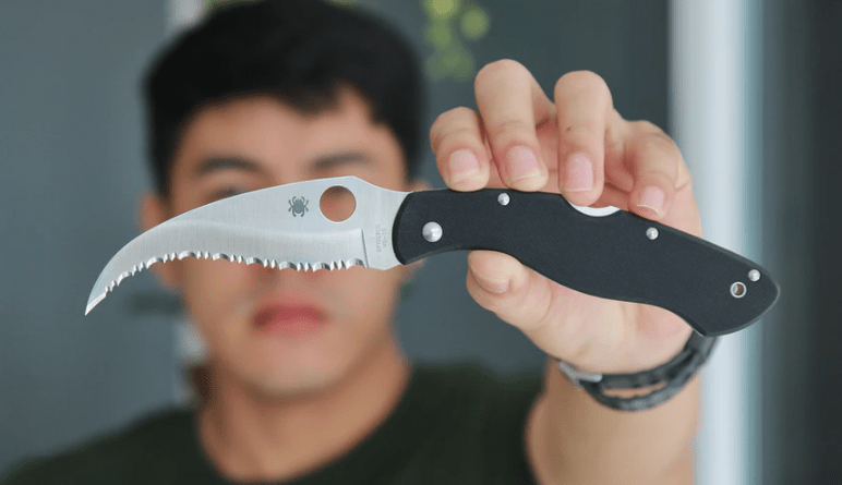 man holding a weapon knife