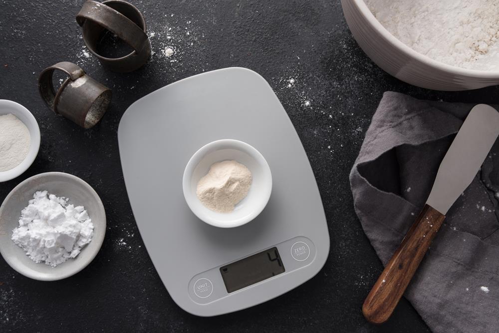 Weighing baking ingredients on a digital scale