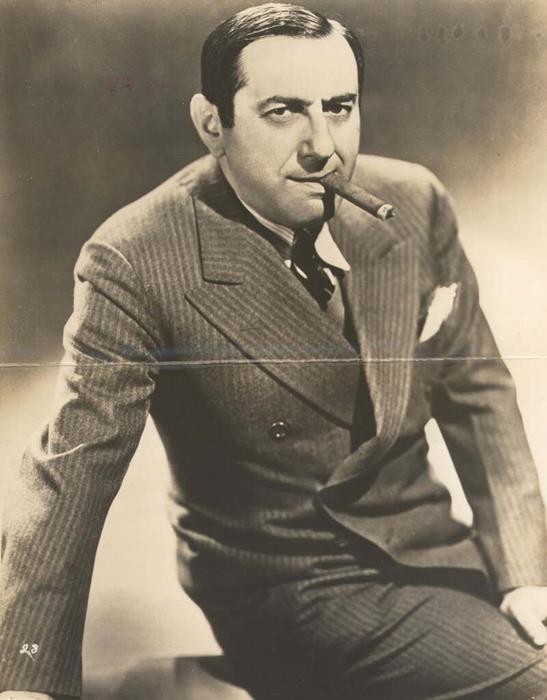 Ernst Lubitsch smoking a cigar, 1949