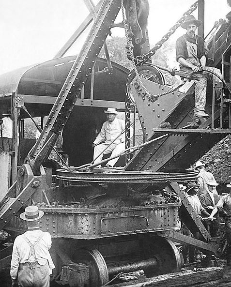 President Theodore Roosevelt sitting on a Bucyrus steam shovel at the Culebra Cut in 1906