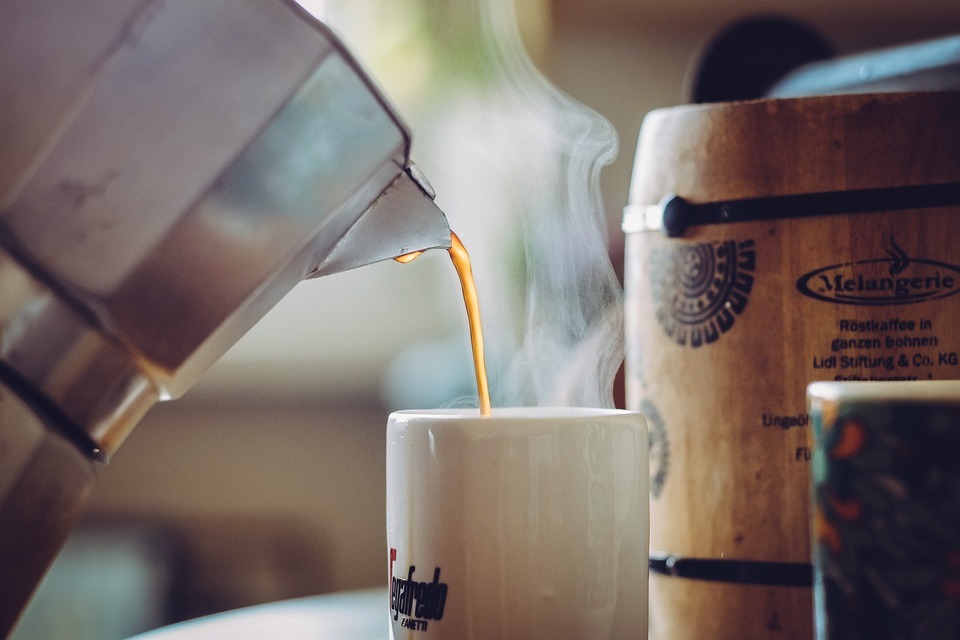 a steaming mug of freshly brewed coffee