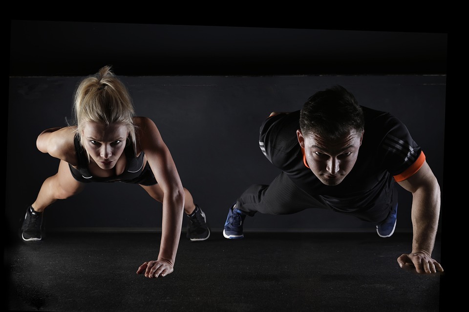 couple exercising to stay fit and healthy 