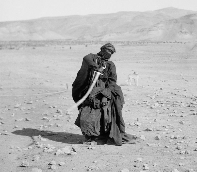 A Bedouin woman performing a sword dance