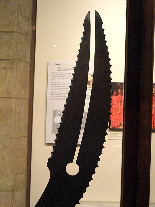 Closeup of the saw-toothed and notched point of the 19th-century Indian-made "Zulfiqar" sword