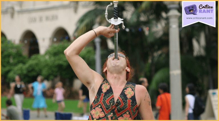 Street entertainer swallowing a sword