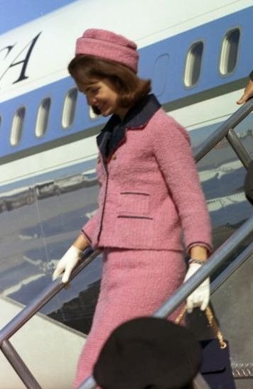 Jackie in pink suit and matching pillbox hat